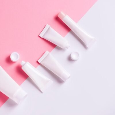https://www.gettyimages.com/detail/photo/cosmetic-products-on-pink-background-royalty-free-image/1299409820?phrase=Sunscreen&adppopup=true