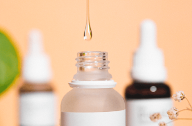 photo of a beauty product in a glass bottle with a pipette