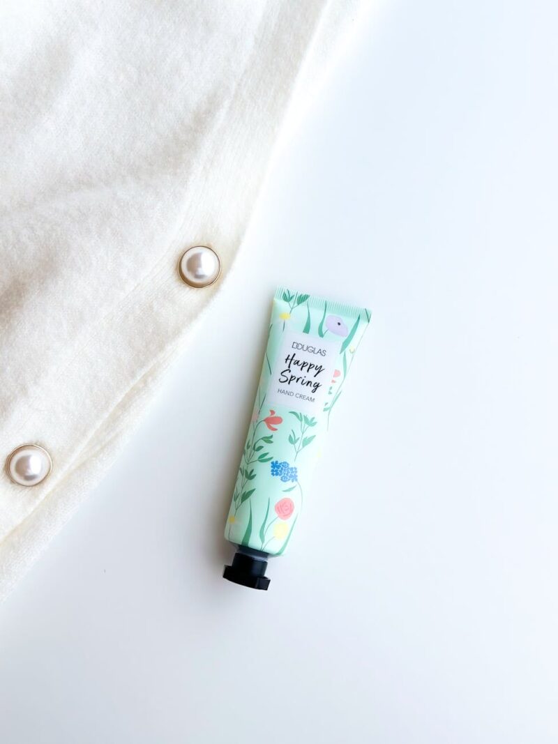 minimalist design hand cream and cozy sweater