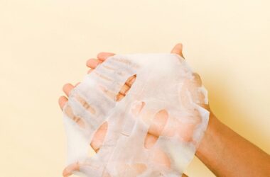 person holding a face mask