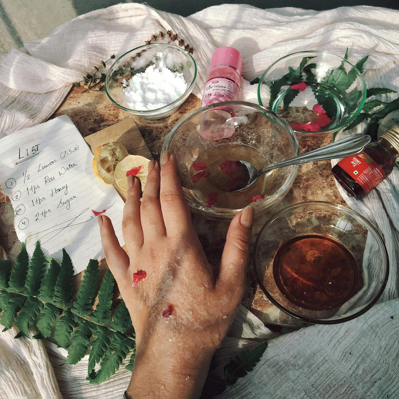 a person holding clear glass bowl