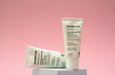 cream tubes on pink background