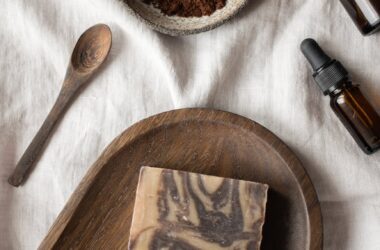 handmade soaps and bowl with coffeee placed on table