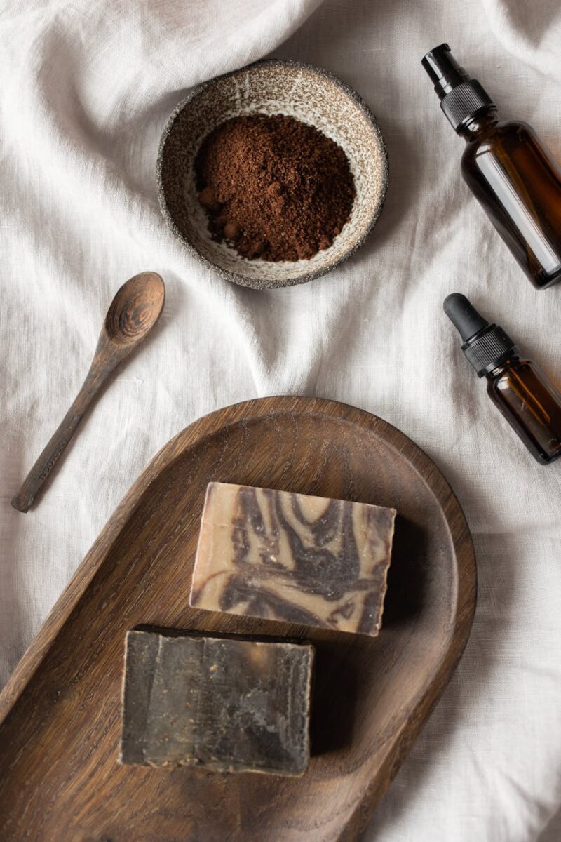 handmade soaps and bowl with coffeee placed on table