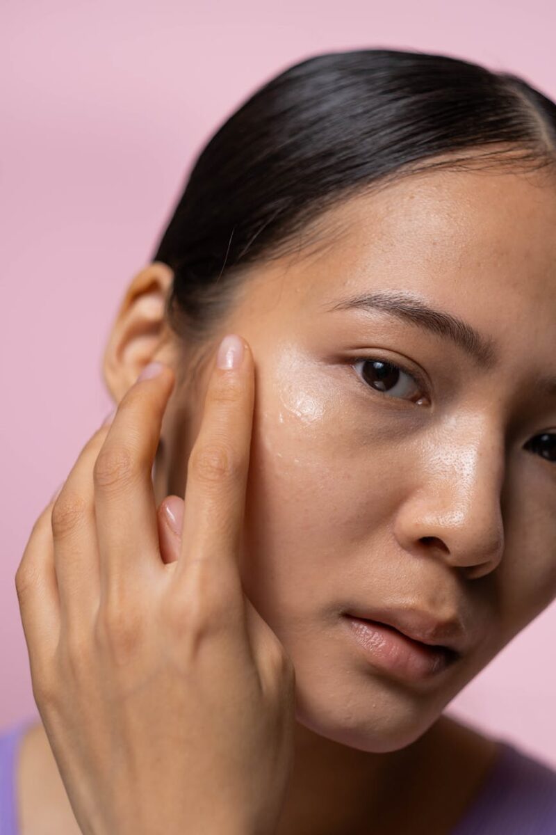 woman with black hair and fair skin