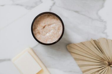 body scrub in black round container