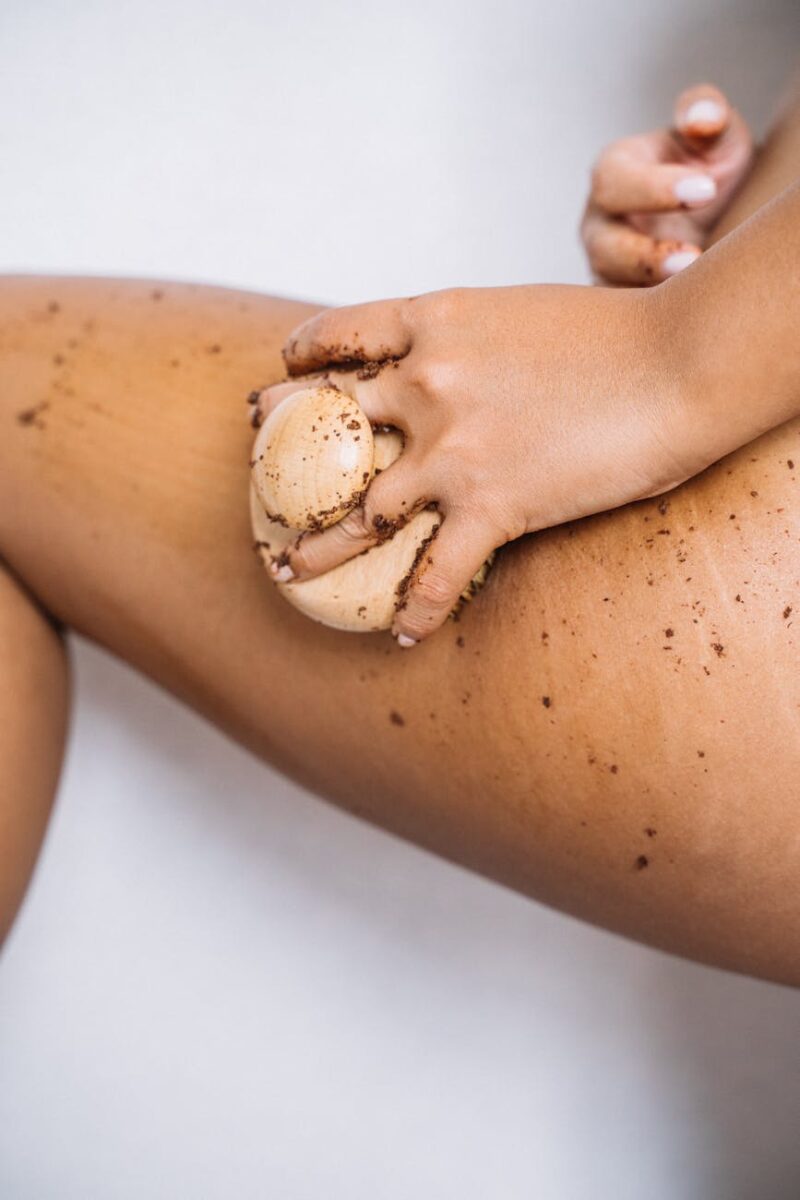 a person brushing her legs